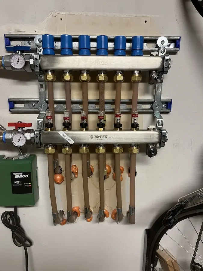 Plumber performing Gas Leak Detection at a residential property in Carrollton